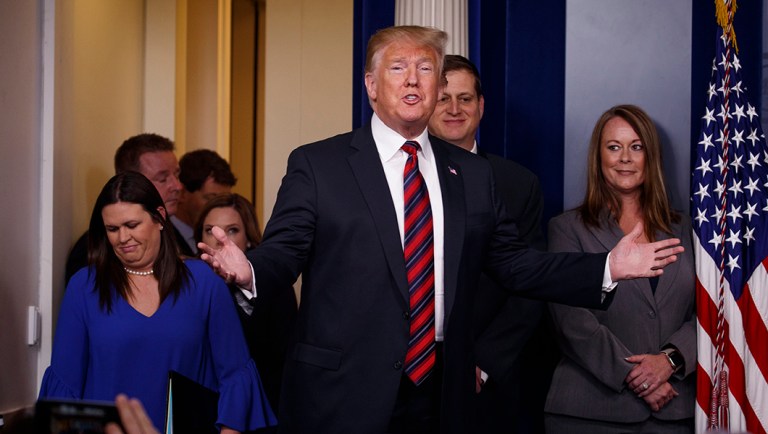 President Trump arrives for a surprise appearance to speak to reporters about border security.