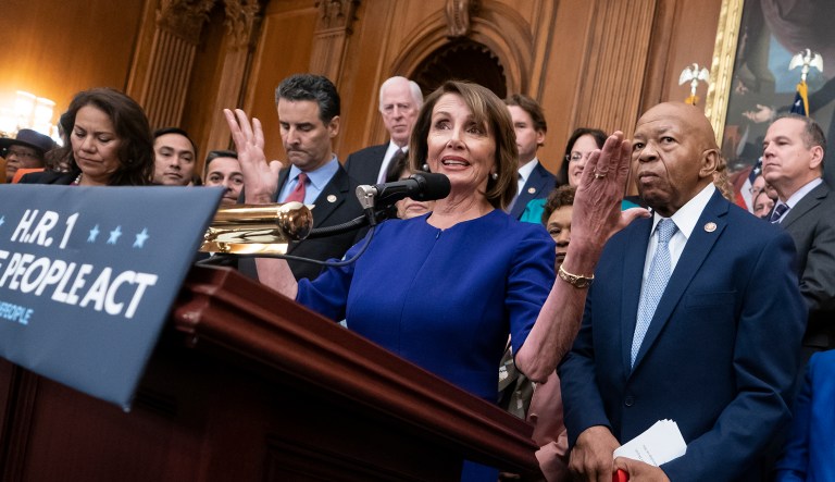 Speaker of the House Nancy Pelosi of Calif., and House Democrats, now in the majority, unveil a comprehensive elections and ethics reform package that targets what they call a "culture of corruption in Washington" and aims to reduce the role of money in politics, at the Capitol in Washington, Friday, Jan. 4, 2019. She is joined from left by Rep. Veronica Escobar, D-Texas, Rep. John Sarbanes, D-Md., Rep. Elijah Cummings, D-Md., chairman of the Committee on Oversight and Government Reform, Rep. Doris Matsui, D-Calif., and Rep. John Lewis, D-Ga. 