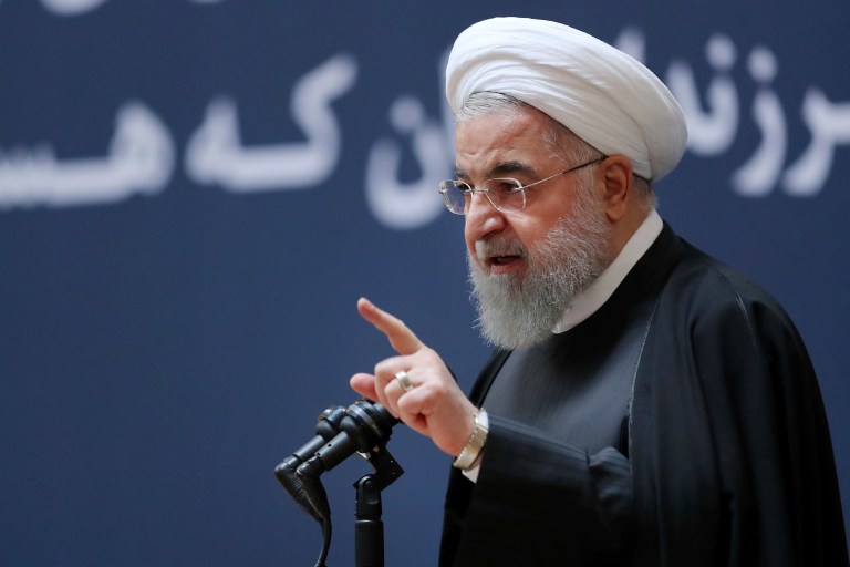 In this photo released by official website of the office of the Iranian Presidency, President Hassan Rouhani speaks at a ceremony.