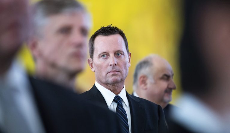 US Ambassador to Germany Richard Allen Grenell, center, at the presidential palace in Berlin Monday, Jan. 14, 2019. 