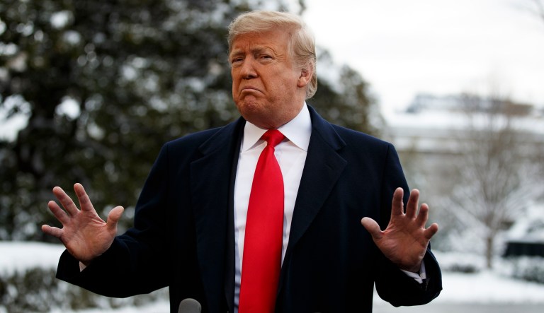 President Trump talks with reporters on the South Lawn of the White House before departing for the American Farm Bureau Federation's 100th Annual Convention in New Orleans, Monday, Jan. 14, 2019, in Washington.