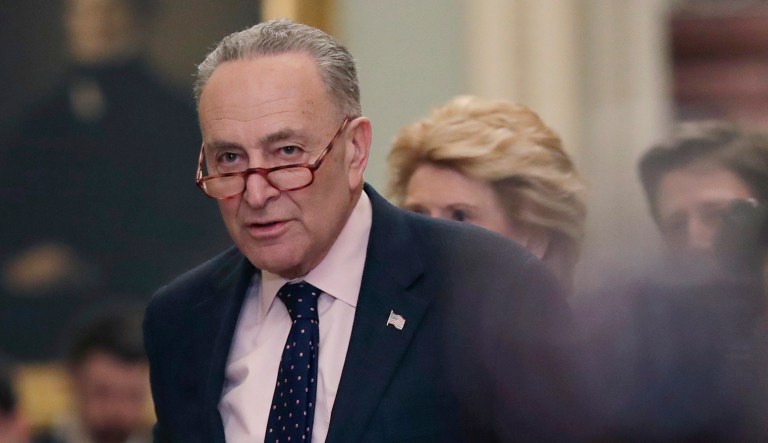 Senate Minority Leader Chuck Schumer, D-N.Y., arrives to speak.