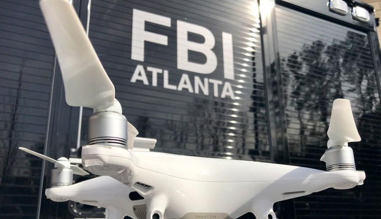 One of a half-dozen drones which have been confiscated for being flown in the no-fly zone over Mercedes-Benz Stadium is displayed Friday, Feb. 1, 2019, in Atlanta, just days before Super Bowl 53.