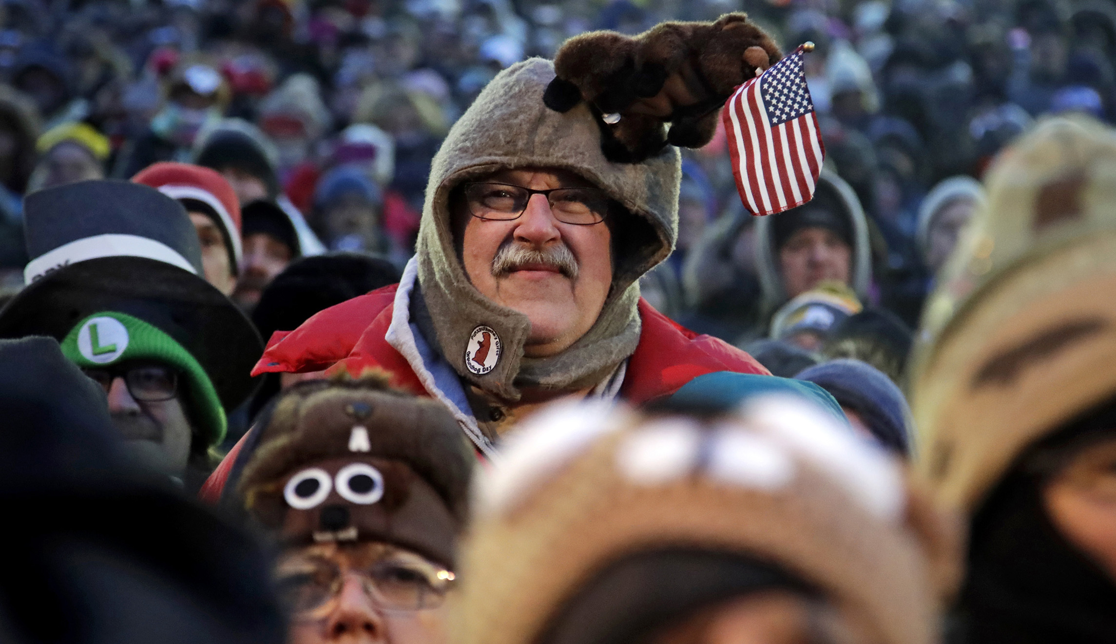 Al Donst of Belvidere, N.J., center, participates in the 133rd celebration of Groundhog Day on Gobbler's Knob in Punxsutawney, Pa., on Saturday.