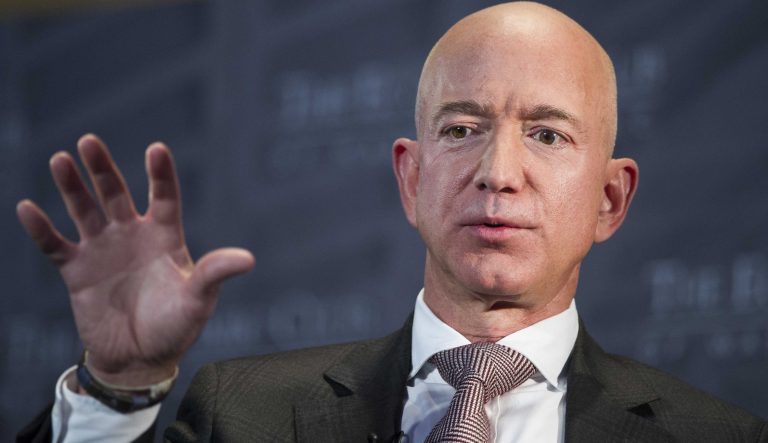 In this Sept. 13, 2018 photo, Jeff Bezos, Amazon founder and CEO, speaks at The Economic Club of Washington's Milestone Celebration in Washington. 