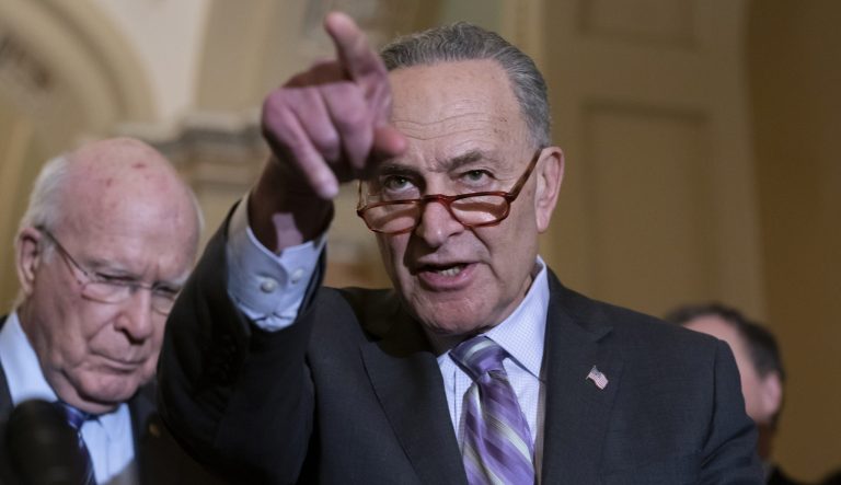 Senate Minority Leader Chuck Schumer, D-N.Y., joined at left by Sen. Patrick Leahy, D-Vt., ranking member of the Senate Appropriations Committee, speaks to reporters about the bipartisan compromise worked out last night by Leahy and others in hope of averting another government shutdown, at the Capitol in Washington, Tuesday, Feb. 12, 2019. 