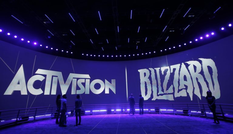 This June 13, 2013 photo shows the Activision Blizzard Booth during the Electronic Entertainment Expo in Los Angeles. The video game maker announced Tuesday, Feb. 12, 2019, it is laying off nearly 800 workers as the company braces for a steep downturn in revenue following the best year in its history.