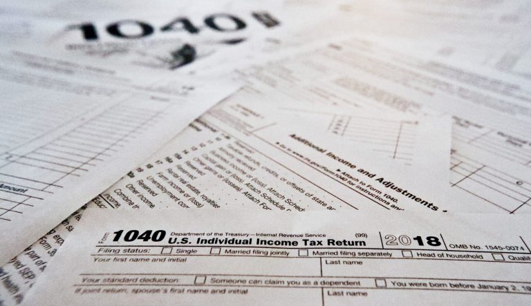 This Wednesday, Feb. 13, 2019, in Zelienople, Pa., shows multiple forms printed from the Internal Revenue Service web page that are used for 2018 U.S. federal tax returns. 