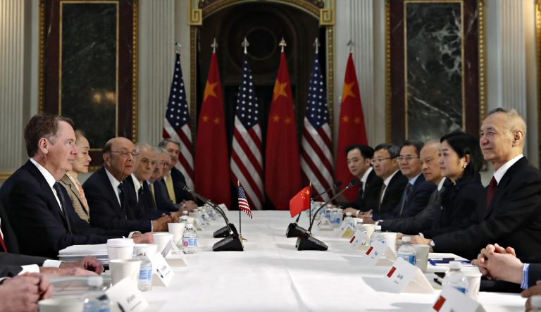 U.S. Trade Representative Robert Lighthizer, left, and Chinese Vice Premier Liu He, right, attend a meeting of senior U.S. and Chinese officials to resume trade negotiations, Thursday, Feb. 21, 2019, in the Indian Treaty Room of the Eisenhower Executive Office Building at the White House complex, in Washington. 