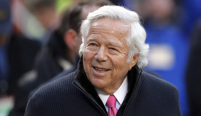 In this Jan. 20, 2019, photo, New England Patriots owner Robert Kraft walks on the field before the AFC Championship NFL football game between the Kansas City Chiefs and the New England Patriots, in Kansas City, Mo.