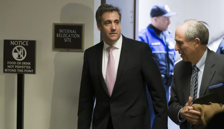 Michael Cohen, left, President Donald Trump's former lawyer, arrives to testify before a closed door hearing of the Senate Intelligence Committee accompanied by his lawyer Lanny Davis of Washington, on Capitol Hill, Tuesday, Feb. 26, 2019, in Washington. 