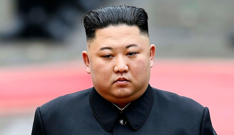 North Korea's leader Kim Jong Un appears at an event.
