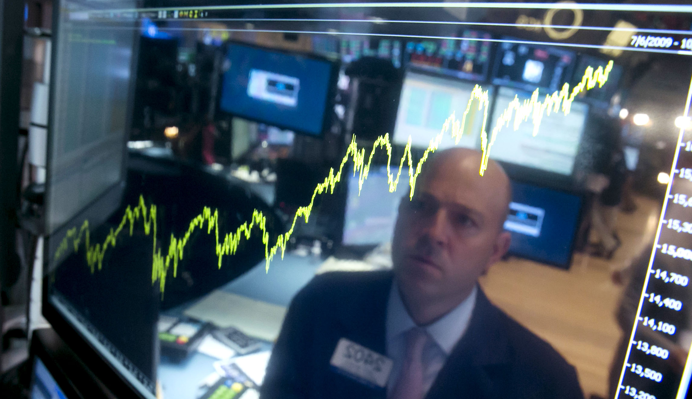Dow Jones briefly crosses 27,000 mark for the first time ever