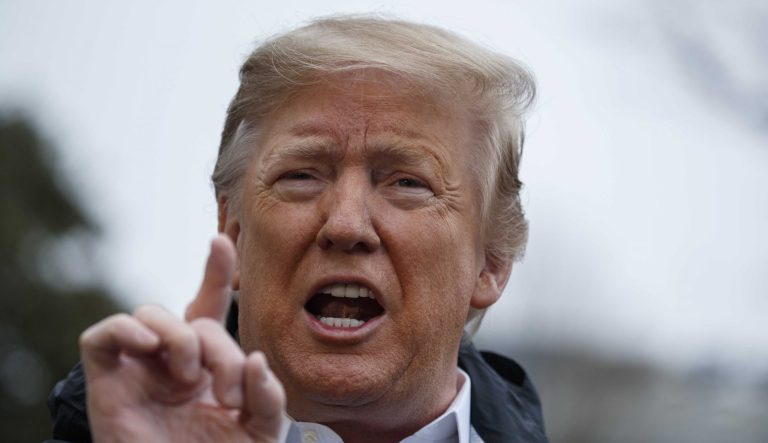 In this March 8, 2019 photo, President Donald Trump talks with reporters outside the White House in Washington. As a presidential candidate, Donald Trump promised not to cut Social Security, Medicare, or Medicaid. In the White House, Trump went back on his promise not to cut Medicaid. 