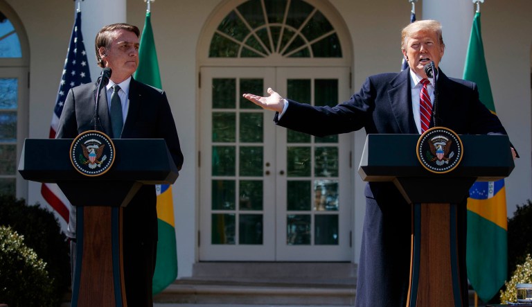 President Trump speaks during a news conference with Brazilian President Jair Bolsonaro in the Rose Garden of the White House in D.C.