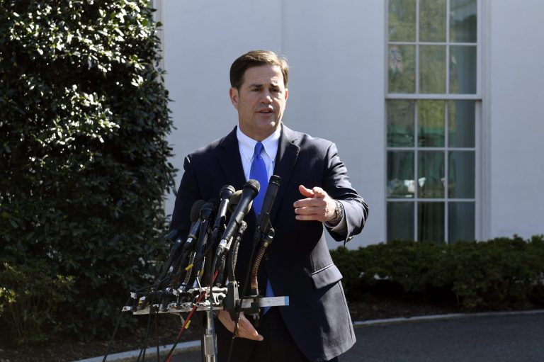 Arizona Gov. Doug Ducey talks to reporters outside the West Wing of the White House in Washington, Wednesday, April 3, 2019, following his meeting with President Donald Trump. 