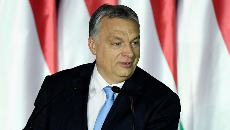 Hungarian Prime Minister Viktor Orban addresses a meeting.
