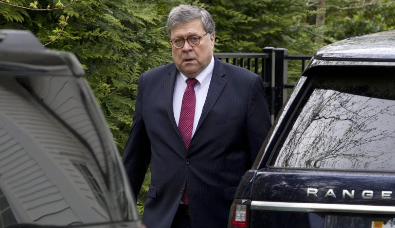 Attorney General William Barr leaves his home in McLean, Va., on Monday, April 15, 2019. Barr told Congress last week he expects to release his redacted version of special counsel Robert Mueller's Trump-Russia investigation report "within a week." 