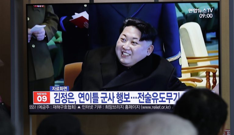 People watch a TV news program reporting about North Korea's test-fire of a "new-type tactical guided weapon," with a file footage of North Korean leader Kim Jong Un, at the Seoul Railway Station in Seoul, South Korea, Thursday, April 18, 2019. North Korea has test-fired a "new-type tactical guided weapon," its state media announced Thursday, in a possible attempt to register displeasure with currently deadlocked nuclear talks with the United States without causing those coveted negotiations to collapse. The part of letters read "Kim Jong Un, tactical guided weapon." 
