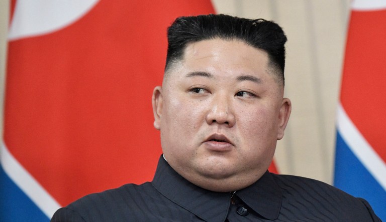 North Korea's leader Kim Jong Un appears at an event.