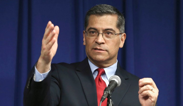In this March 5, 2019 photo, California Attorney General Xavier Becerra speaks during a news conference in Sacramento, Calif. 