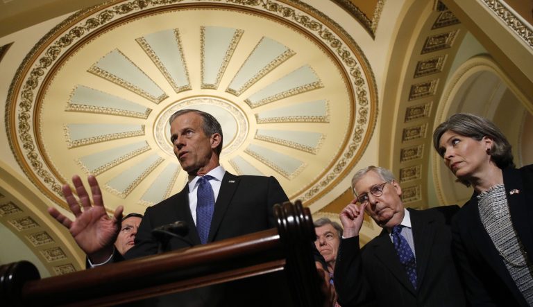Senate Majority Whip John Thune, R-S.D., joined by Senate Majority Leader Mitch McConnell of Ky., second from right, and Sen. Joni Ernst, R-Iowa, speaks to members of the media following a Senate policy luncheon, Tuesday, April 30, 2019, on Capitol Hill in Washington. 