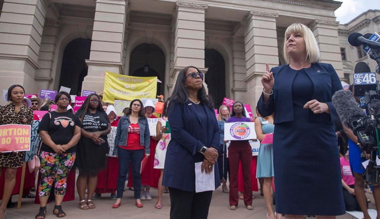 Staci Fox, CEO and President of Planned Parenthood Southeast, speaks during a rally against HB481 outside of the Georgia State Capitol building following the signing of HB 481 in Atlanta.