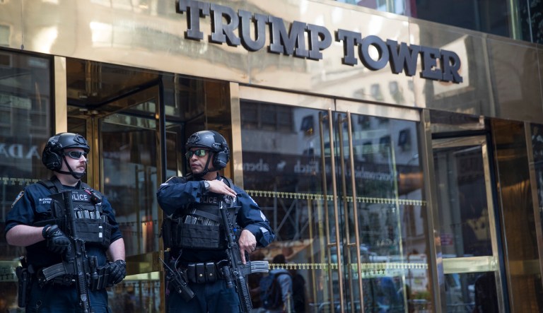 Heavily armed police officers stand guard outside Trump Tower, Thursday, May 16, 2019, in New York.