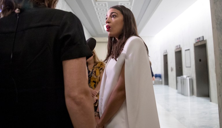 Rep. Alexandria Ocasio-Cortez, D-N.Y., speaks to a reporter on Capitol Hill in Washington, Tuesday, May 21, 2019.