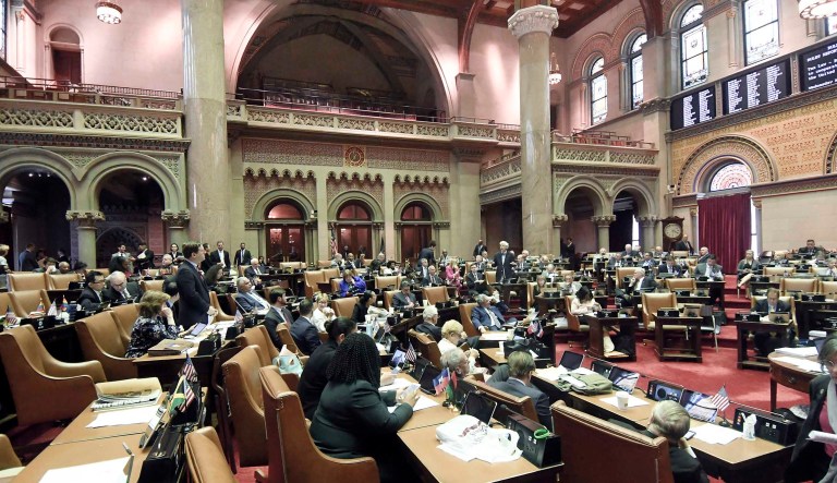 Members of the New York state Assembly debate legislation that authorizes state tax officials to release, if requested, individual New York state tax returns to Congress, during a vote in the Assembly Chamber at the state Capitol Wednesday, May 22, 2019, in Albany, N.Y.