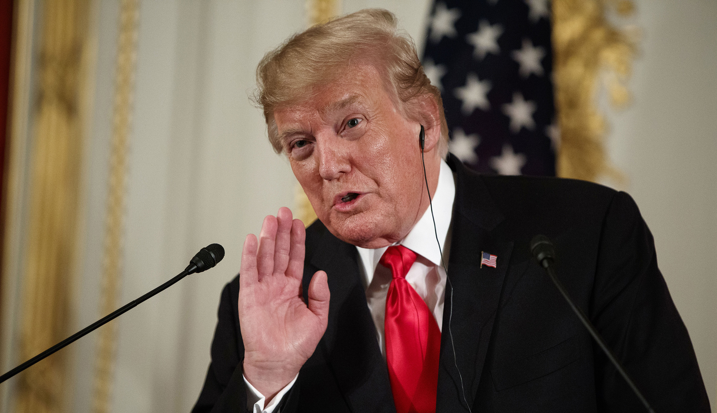 Trump says he is not looking for regime change in Iran