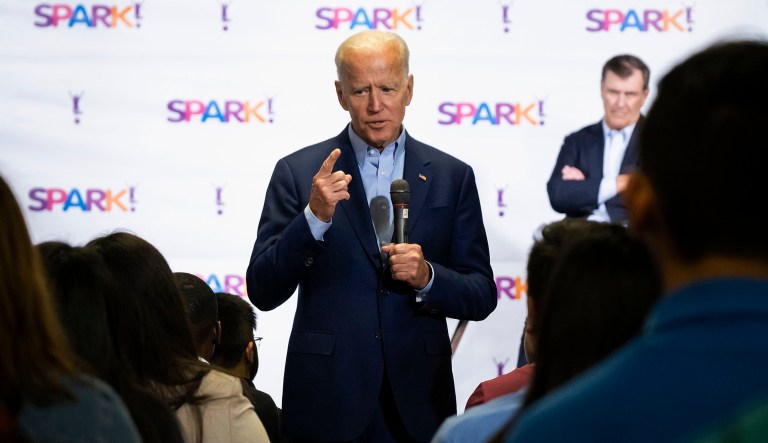 Democratic presidential candidate Joe Biden speaks to participants in the Dallas Mayor's Intern Fellows Program as Dallas Mayor Mike Rawlings looks on during a campaign event at SPARK! on May 29 in Dallas. 