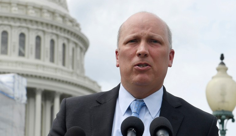 Rep. Chip Roy, R-Texas, center, speaks in Washington.