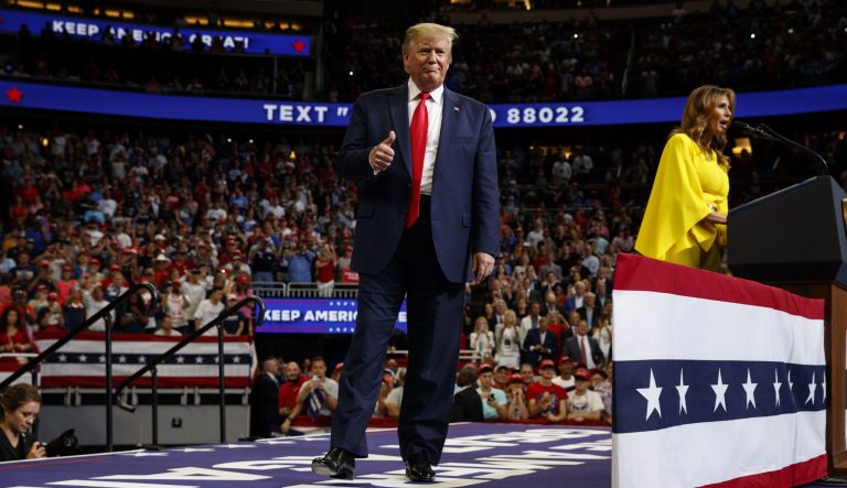President Donald Trump arrives to speak at his re-election kickoff rally at the Amway Center, Tuesday, June 18, 2019, in Orlando, Fla., as first lady Melania Trump speaks. 