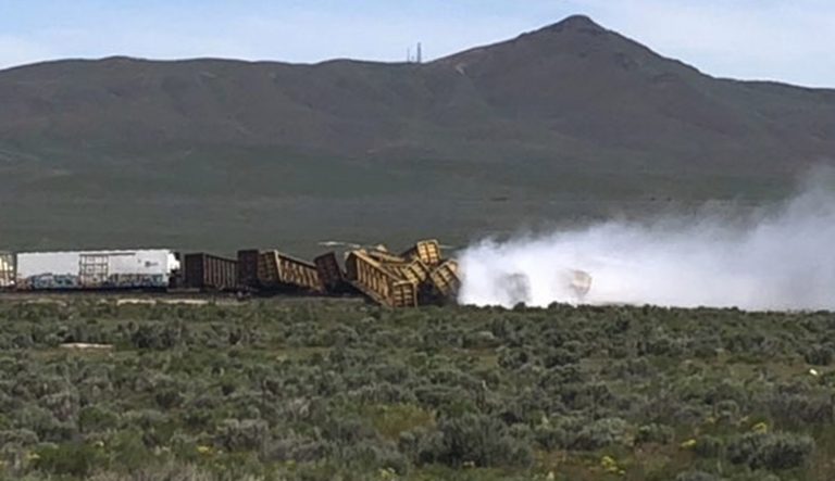 In this photo provided by Michael Lyday shows a train derailment and potential hazardous materials spill east of Wells, Nev., Wednesday, June 19, 2019. 