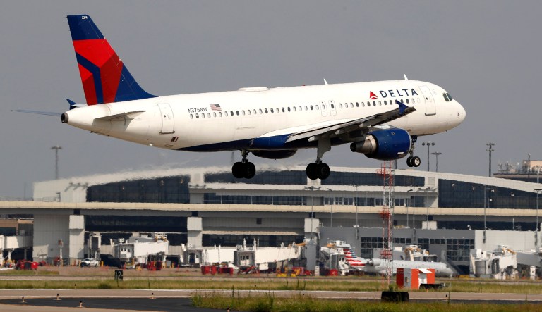 A Delta Airlines aircraft makes its approach at Dallas-Fort Worth International Airport in Grapevine, Texas.