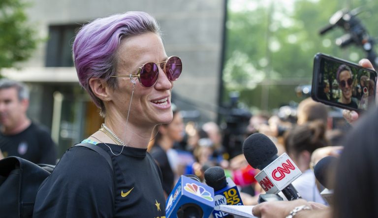 United States women's soccer team member Megan Rapinoe speaks to the media upon her arrival at a hotel Monday, July 8, 2019, in New York. 