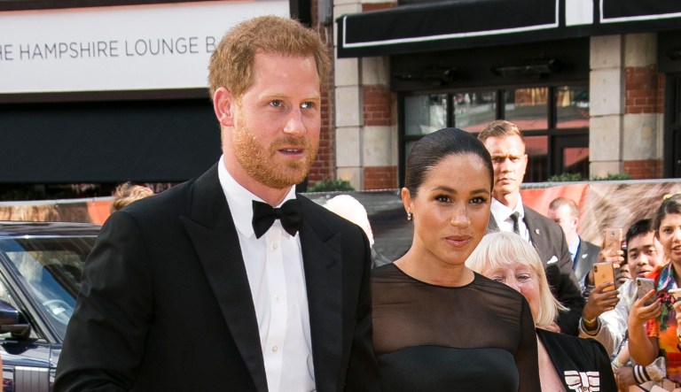 Britain's Prince Harry, left, and Meghan, Duchess of Sussex arrive at the 'Lion King' European premiere in central London.