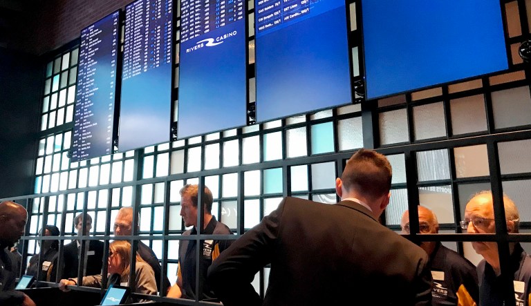 Employees at Rivers Casino and Resort prepare for the opening of its sports betting lounge in Schenectady, New York.