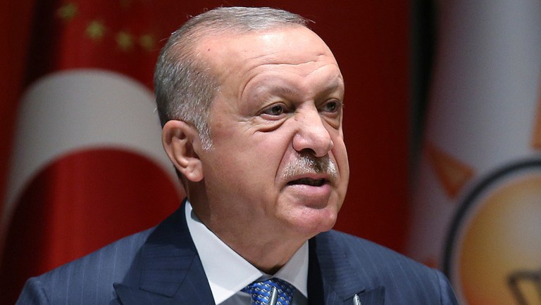 Turkey's President Recep Tayyip Erdogan addresses his ruling party members, in Ankara, Turkey, Friday, July 26, 2019. 