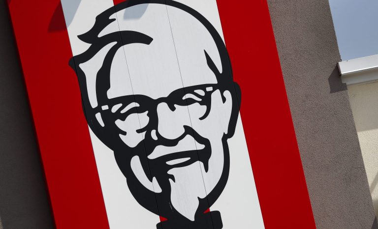 In this photo taken Tuesday, July 30, 2019, a sign outside a Kentucky Fried Chicken restaurant in Conyers, Ga.is shown. 