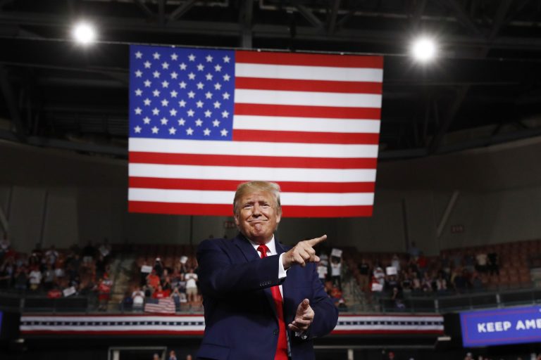 President Donald Trump reacts at the end of his speech at a campaign rally, Thursday, Aug. 15, 2019, in Manchester, N.H.