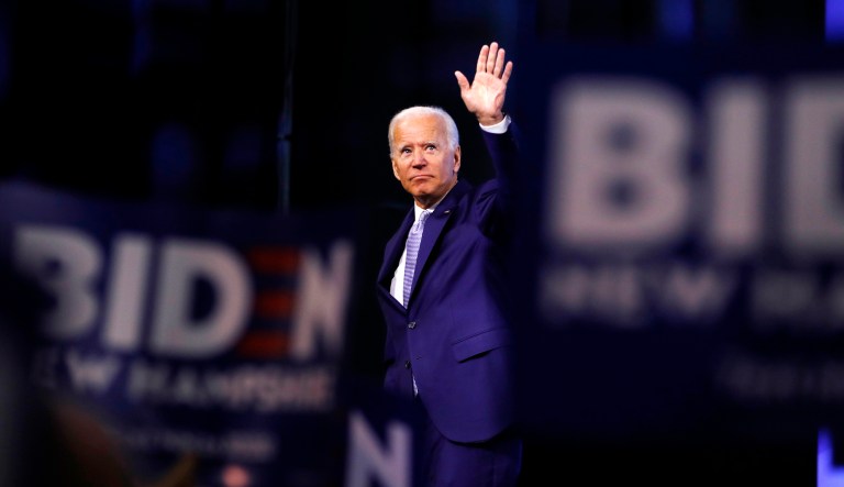 Democratic presidential candidate former Vice President Joe Biden waves before leaving the stage after speaking at the New Hampshire state Democratic Party convention.