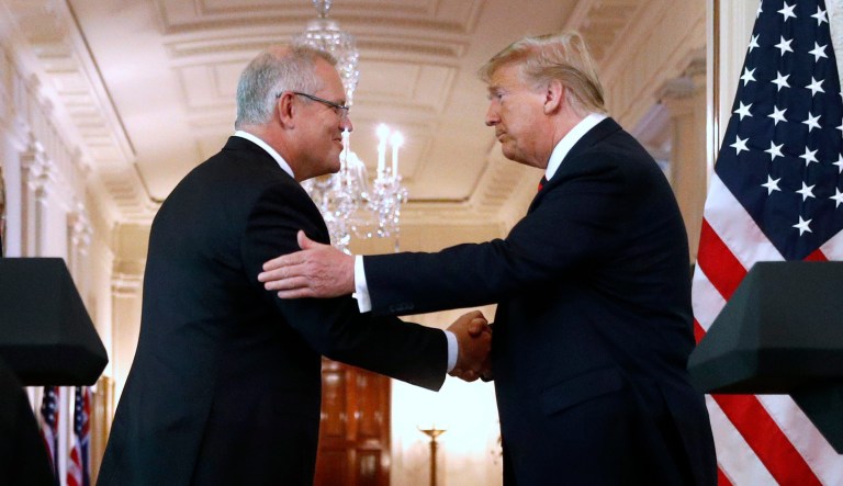 President Trump shakes hands with Australian Prime Minister Scott Morrison after speaking at a news conference in the East Room of the White House Friday in Washington. 