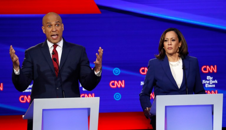 Democratic presidential candidate Sen. Cory Booker, D-N.J., left, and Sen. Kamala Harris, D-Calif., participate in a Democratic presidential primary debate hosted by CNN/New York Times at Otterbein University, Tuesday, Oct. 15, 2019, in Westerville, Ohio.