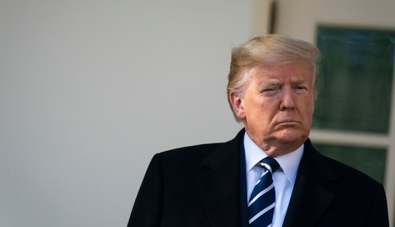 President Donald Trump listens as Israeli Prime Minister Benjamin Netanyahu talks with reporters before a meeting in the Oval Office of the White House, Monday, Jan. 27, 2020, in Washington.            