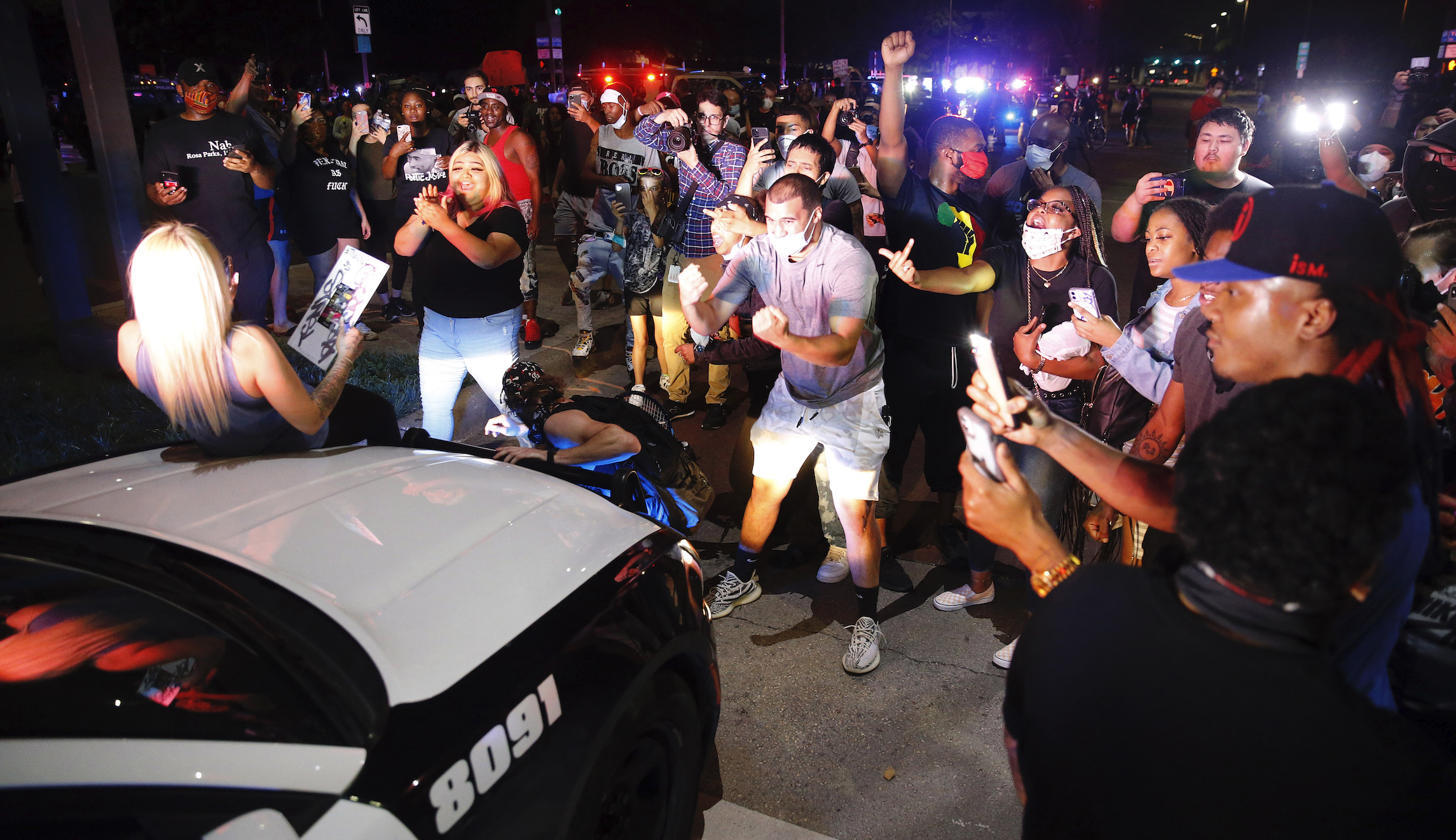 Man beaten in viral video while defending neighborhood during riots in stable condition, police say
