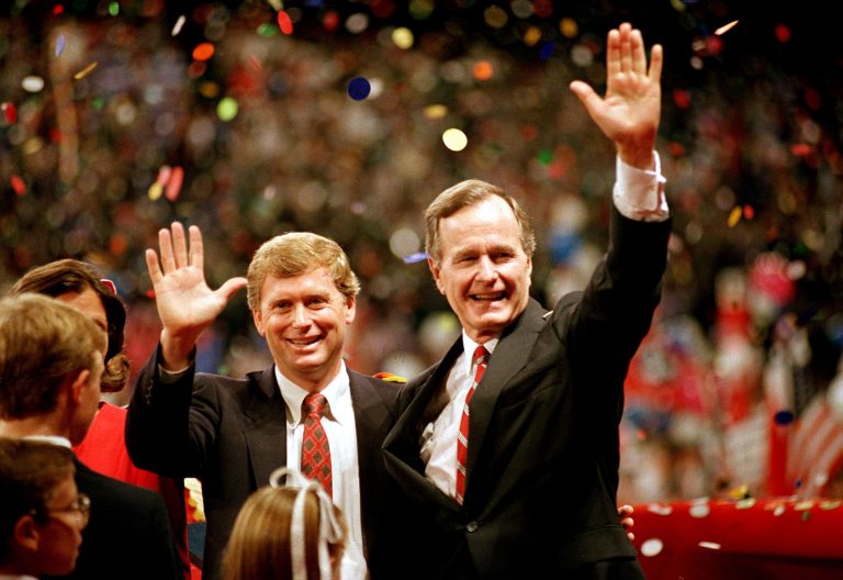 Vice President George Bush and his running mate, Indiana Sen. Dan Quayle, wave to the assembly of the Republican National Convention in New Orleans.