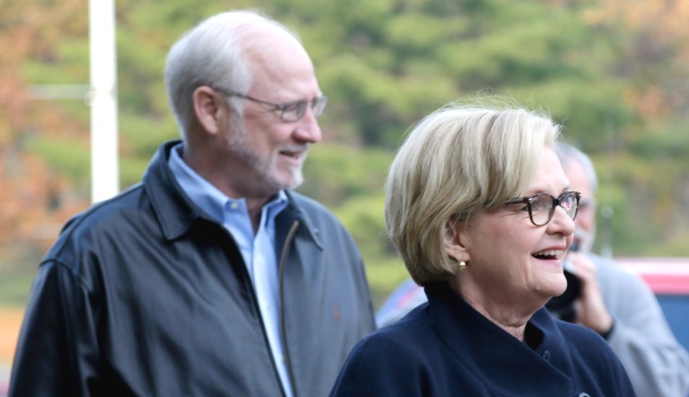Sen Claire McCaskill, D-Mo., walks with her husband, Joseph Shepard (pictured left), in Kirkwood, Mo.