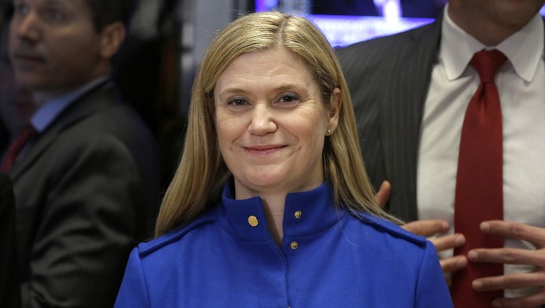 J.P. Morgan CFO Marianne Lake visits the trading floor after ringing the New York Stock Exchange opening bell, Wednesday, Feb. 24, 2016.  (AP Photo/Richard Drew)